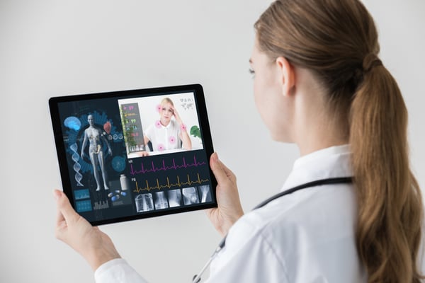 Patient seeking telemedicine and telehealth talking to doctor on tablet